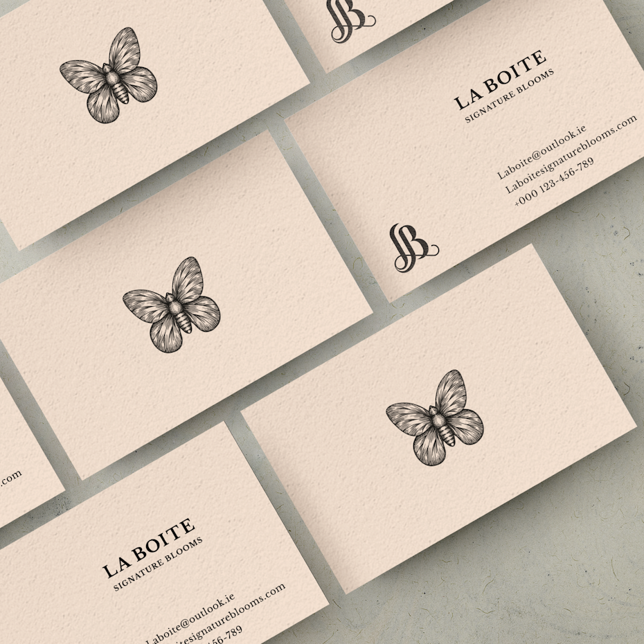 Business cards trends 2020 example: Butterfly drawing business card